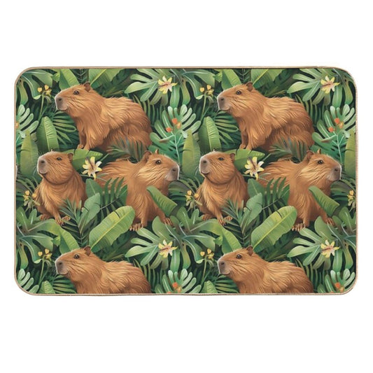 Cute Capybaras Frolic Amidst Lush Tropical Plants  Absorbent Bath Mat