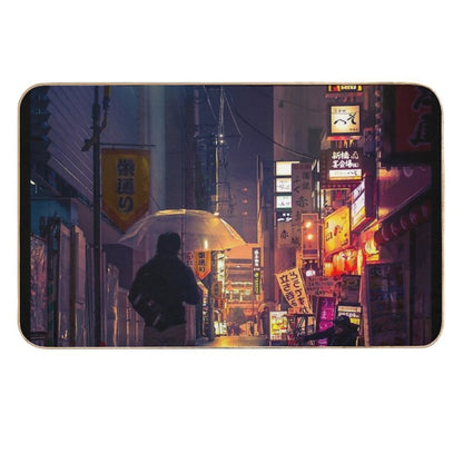 Neon Noir Street Reflecting The Warm Yellow And Orange Light from The Bar Area.  Pet-Safe Bath Mat