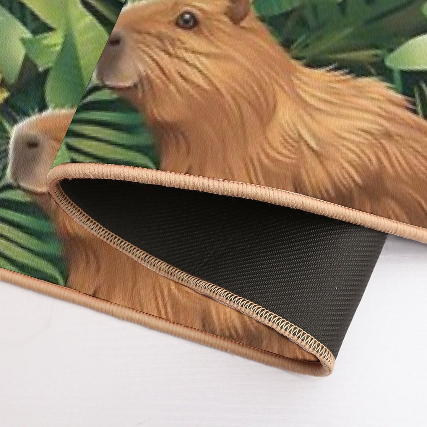 Cute Capybaras Frolic Amidst Lush Tropical Plants  Absorbent Bath Mat